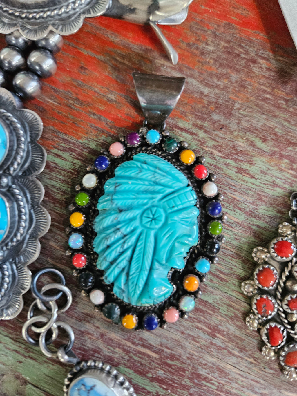 Carved Turquoise Chief Pendant